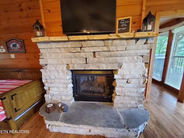 2859 Eagle Crest Way, Sevierville, TN 37876 - detailed view of a fireplace, wood finished floors, and wood walls