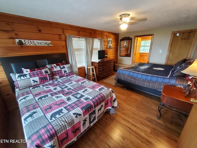 2859 Eagle Crest Way, Sevierville, TN 37876 - bedroom with wood finished floors and wooden walls