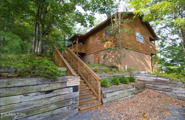 2859 Eagle Crest Way, Sevierville, TN 37876 - view of home's exterior with stairs and a wooden deck