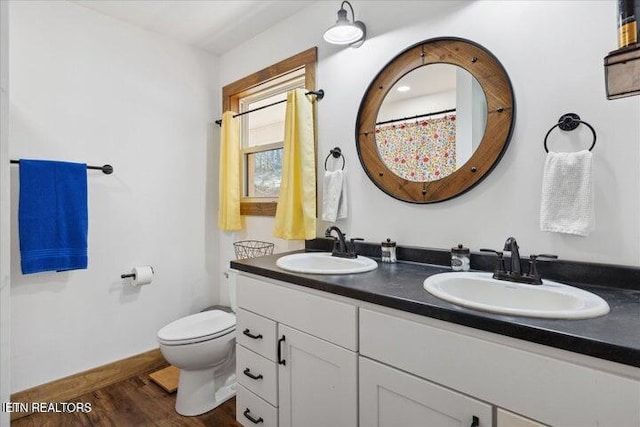 6131 Happy Valley Loop, Tallassee, TN 37878 - bathroom featuring double vanity, toilet, and wood finished floors