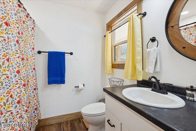 6131 Happy Valley Loop, Tallassee, TN 37878 - full bath with toilet, wood finished floors, vanity, a shower with curtain, and baseboards