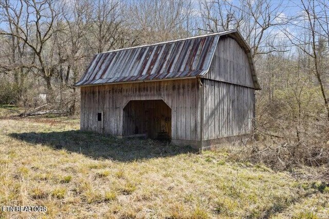 6131 Happy Valley Loop, Tallassee, TN 37878 - view of barn featuring a forest view