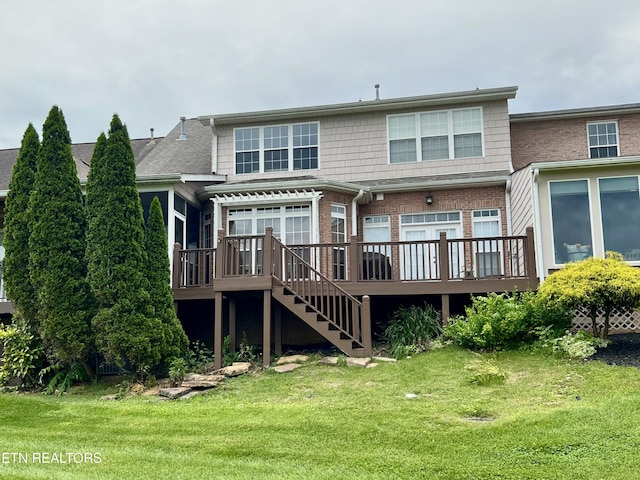 1077 Creekside Village Way, Seymour, TN 37865 - back of property with a wooden deck, stairs, and a lawn