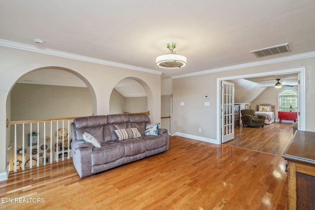 1077 Creekside Village Way, Seymour, TN 37865 - living area featuring wood finished floors, a ceiling fan, crown molding, baseboards, and french doors