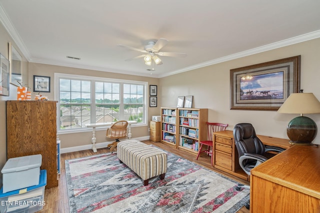 1077 Creekside Village Way, Seymour, TN 37865 - home office featuring wood finished floors, crown molding, a ceiling fan, and baseboards