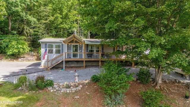 235 Neely Dr, New Tazewell, TN 37825 - ranch-style house with a porch