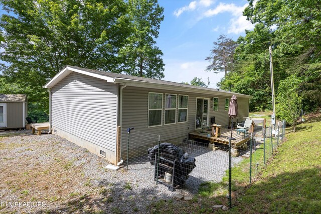 235 Neely Dr, New Tazewell, TN 37825 - rear view of house with crawl space and a deck