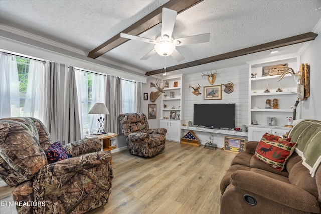 235 Neely Dr, New Tazewell, TN 37825 - living room with a textured ceiling, beamed ceiling, light wood-style floors, ornamental molding, and ceiling fan