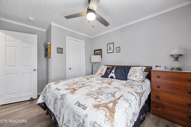 235 Neely Dr, New Tazewell, TN 37825 - bedroom with wood finished floors, ceiling fan, and ornamental molding