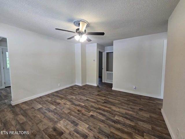 678 Skyline Dr, Oneida, TN 37841 - unfurnished room featuring dark wood-style flooring, a textured ceiling, baseboards, and a ceiling fan