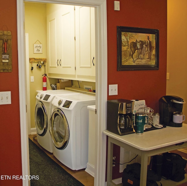 120 Lakeside Dr, Kingston, TN 37763 - laundry area featuring washing machine and clothes dryer, cabinet space, and baseboards