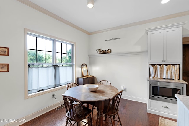 2811 Pleasant View Ave, Maryville, TN 37803 - dining space featuring baseboards, crown molding, dark wood-style flooring, and recessed lighting