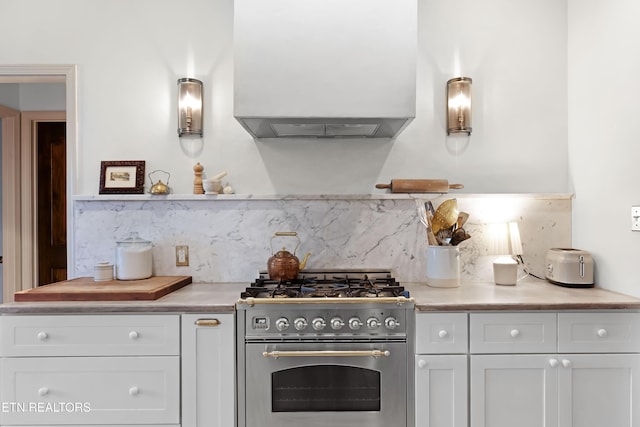 2811 Pleasant View Ave, Maryville, TN 37803 - kitchen with high end stove, custom range hood, backsplash, white cabinetry, and light countertops