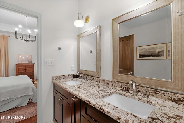 2811 Pleasant View Ave, Maryville, TN 37803 - full bath featuring a chandelier, double vanity, and ensuite bath
