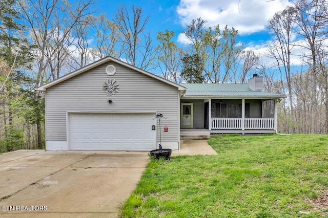 108 W Bobcat Ln, Wilder, TN 38589 - single story home featuring a chimney, a porch, a front yard, driveway, and metal roof