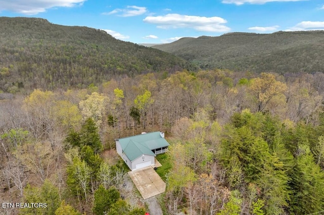 108 W Bobcat Ln, Wilder, TN 38589 - view of subject property with a heavily wooded area and a mountain backdrop