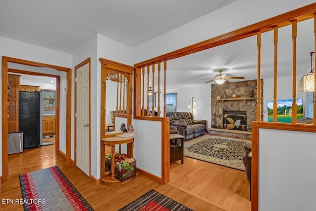 108 W Bobcat Ln, Wilder, TN 38589 - hallway featuring wood finished floors and baseboards