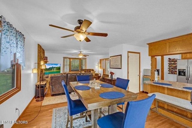 108 W Bobcat Ln, Wilder, TN 38589 - dining space featuring ceiling fan and light wood-style flooring