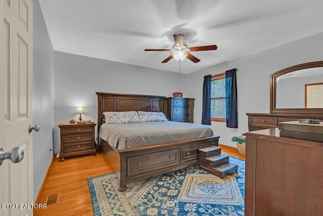 108 W Bobcat Ln, Wilder, TN 38589 - bedroom featuring light wood-style floors, baseboards, and ceiling fan