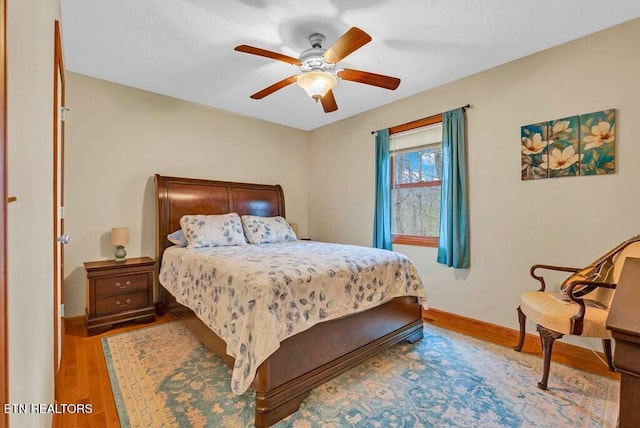 108 W Bobcat Ln, Wilder, TN 38589 - bedroom with wood finished floors, baseboards, and ceiling fan