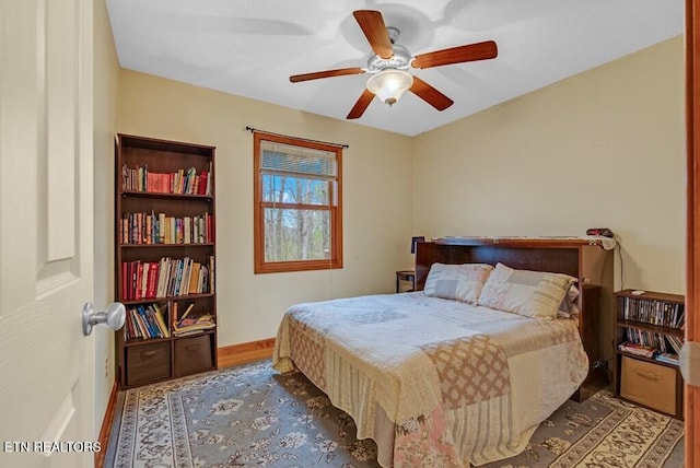 108 W Bobcat Ln, Wilder, TN 38589 - bedroom with baseboards, wood finished floors, and ceiling fan