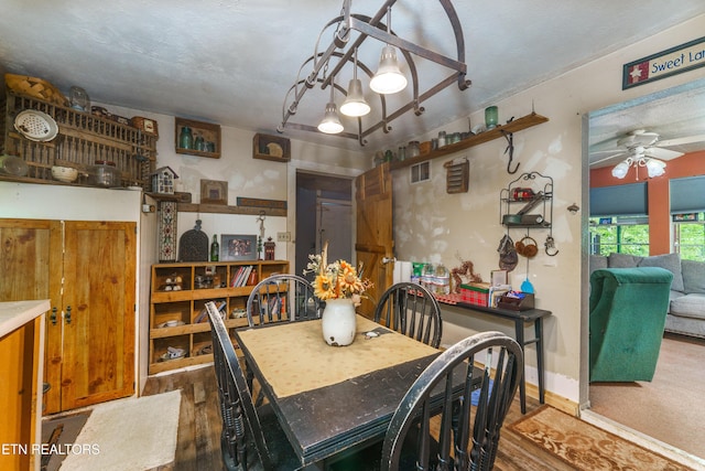 4349 Locust Ridge Rd, Sevierville, TN 37876 - dining room featuring ceiling fan, wood finished floors, and baseboards