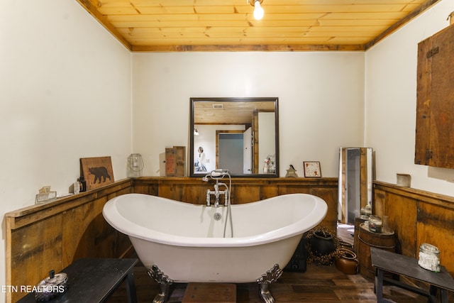 4349 Locust Ridge Rd, Sevierville, TN 37876 - full bath with wood ceiling, a freestanding tub, and wood finished floors