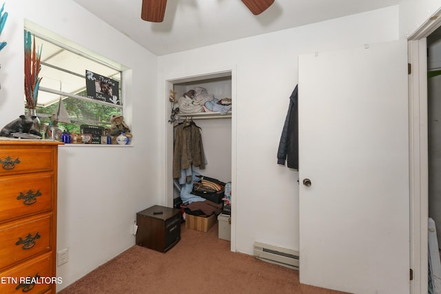 4349 Locust Ridge Rd, Sevierville, TN 37876 - bedroom featuring a baseboard heating unit, light colored carpet, a closet, and ceiling fan