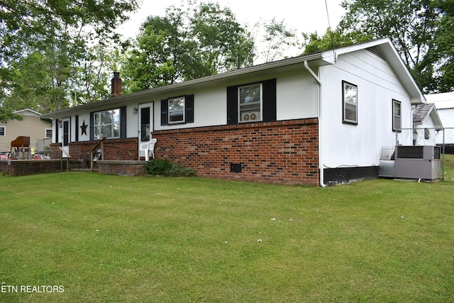 106 Walnut St, New Tazewell, TN 37825 - single story home with brick siding, a front lawn, a chimney, and cooling unit