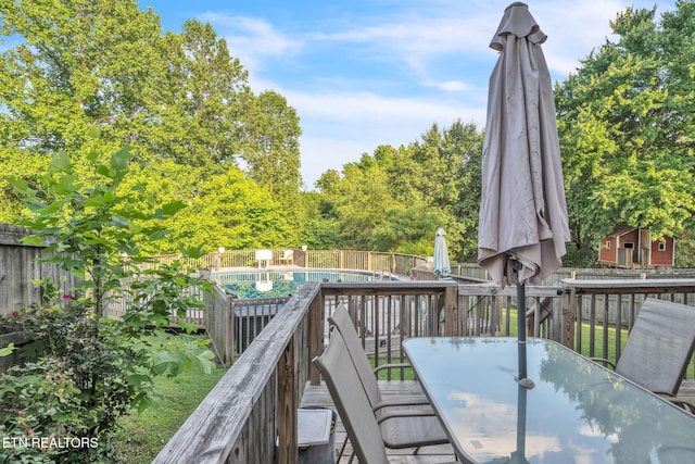 6608 Hickory Way Ln, Knoxville, TN 37918 - wooden terrace with a fenced backyard and outdoor dining space