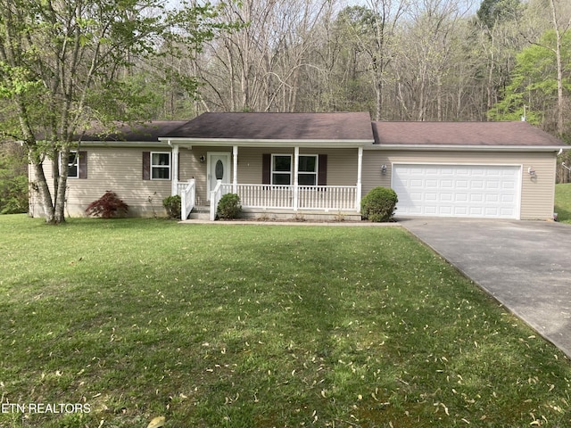 68 Pine Mountain Cir, Pineville, KY 40977 - ranch-style house with covered porch, concrete driveway, a garage, and a front lawn