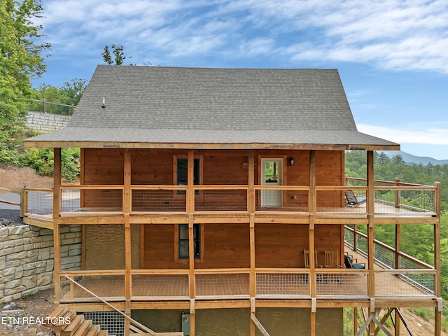 1027 Leslie Way, Sevierville, TN 37876 - back of property with roof with shingles, stairway, and a deck with mountain view