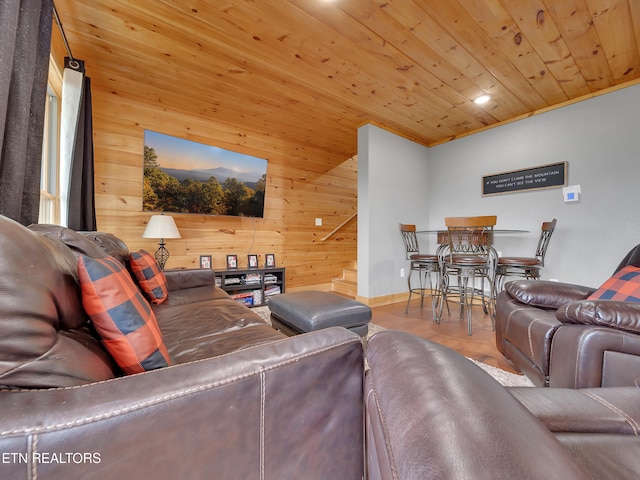 1027 Leslie Way, Sevierville, TN 37876 - living room featuring wooden walls, wooden ceiling, and baseboards