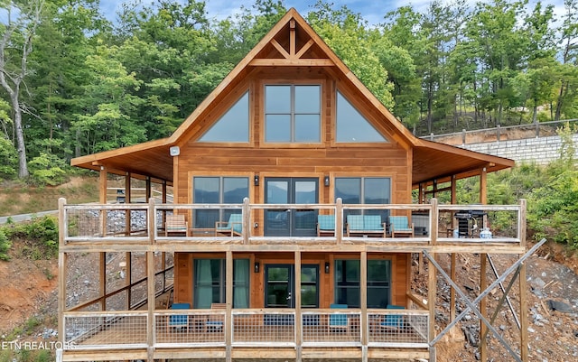 1027 Leslie Way, Sevierville, TN 37876 - rear view of house with a deck and stairway