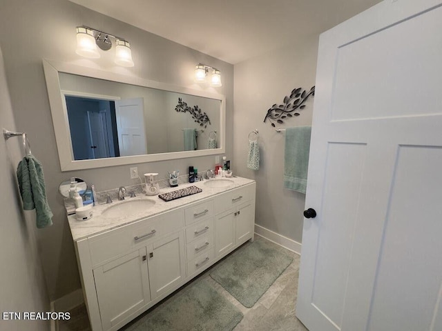 323 Wilson Hurst St, Tazewell, TN 37879 - full bath with double vanity and baseboards