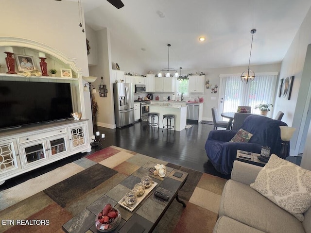 323 Wilson Hurst St, Tazewell, TN 37879 - living room with baseboards, a chandelier, ceiling fan, recessed lighting, and dark wood finished floors