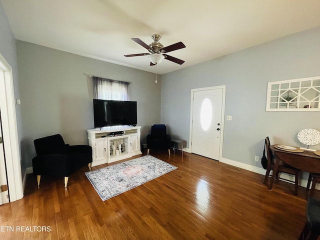 5422 Cricket Ln, Walland, TN 37886 - living room featuring a ceiling fan, dark wood-style flooring, healthy amount of natural light, and baseboards