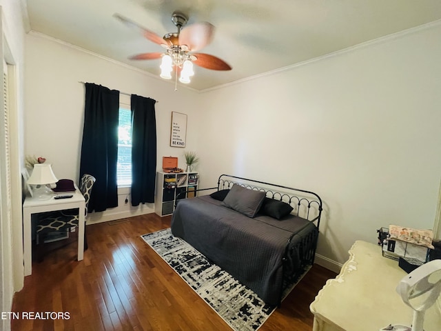 5422 Cricket Ln, Walland, TN 37886 - bedroom with dark wood-style flooring, baseboards, crown molding, and ceiling fan