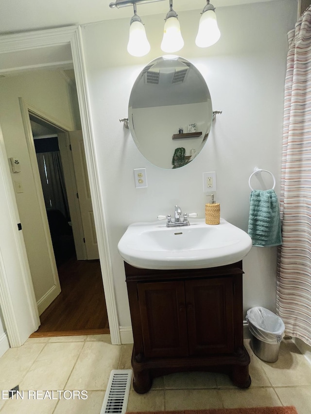 5422 Cricket Ln, Walland, TN 37886 - bathroom featuring tile patterned flooring and vanity
