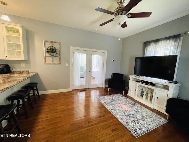 5422 Cricket Ln, Walland, TN 37886 - living room with healthy amount of natural light, wood finished floors, a ceiling fan, and baseboards