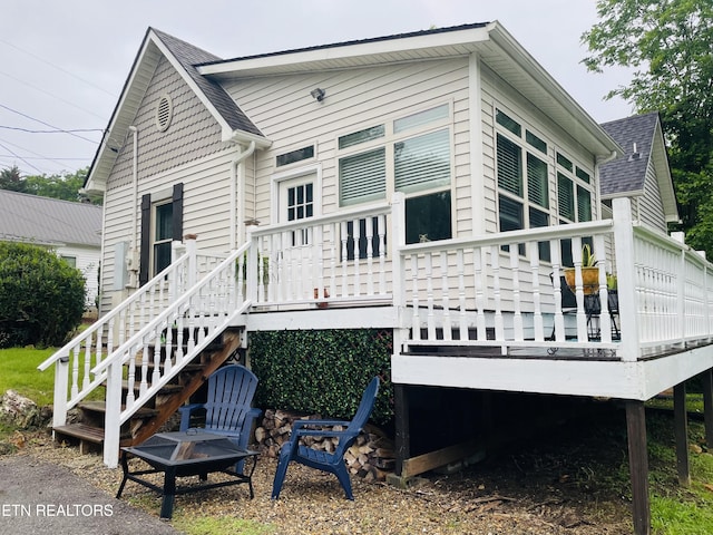 5422 Cricket Ln, Walland, TN 37886 - rear view of house featuring a deck and roof with shingles