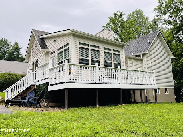 5422 Cricket Ln, Walland, TN 37886 - back of house with a chimney, a deck, and a lawn