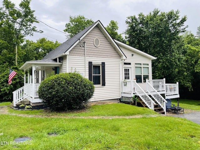 5422 Cricket Ln, Walland, TN 37886 - view of front of home featuring a front yard, a wooden deck, and stairs