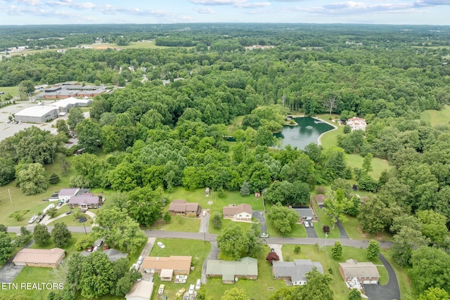 1036 Hawthorn Dr, Cookeville, TN 38501 - aerial perspective of suburban area featuring a heavily wooded area and a nearby body of water
