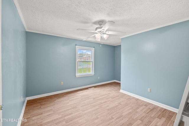 1036 Hawthorn Dr, Cookeville, TN 38501 - unfurnished room featuring crown molding, wood finished floors, a textured ceiling, ceiling fan, and baseboards