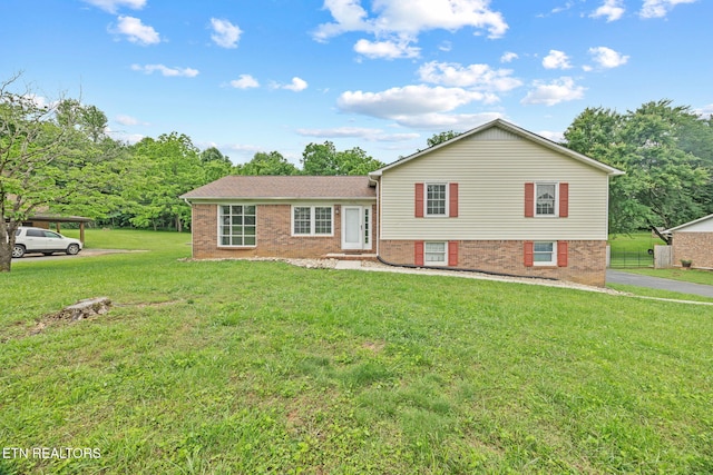 1036 Hawthorn Dr, Cookeville, TN 38501 - tri-level home with a front lawn and brick siding