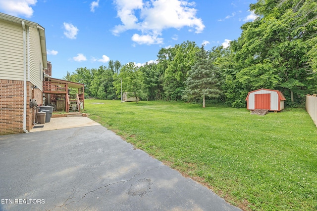 1036 Hawthorn Dr, Cookeville, TN 38501 - view of grassy yard with a patio area, stairway, and a deck