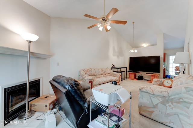 692 Shadywood Ln, Knoxville, TN 37923 - carpeted living area featuring high vaulted ceiling, a glass covered fireplace, and a ceiling fan