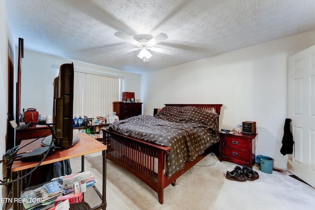 692 Shadywood Ln, Knoxville, TN 37923 - bedroom with carpet flooring, a ceiling fan, and a textured ceiling