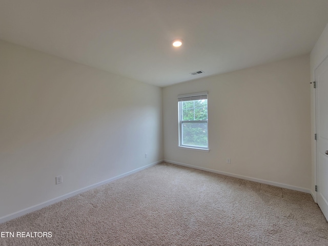 12043 Lillibridge Crossing Ln, Knoxville, TN 37932 - spare room featuring light carpet, baseboards, and recessed lighting